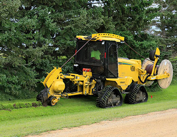 Compact Ride On Tractor For Underground Utility Installation
